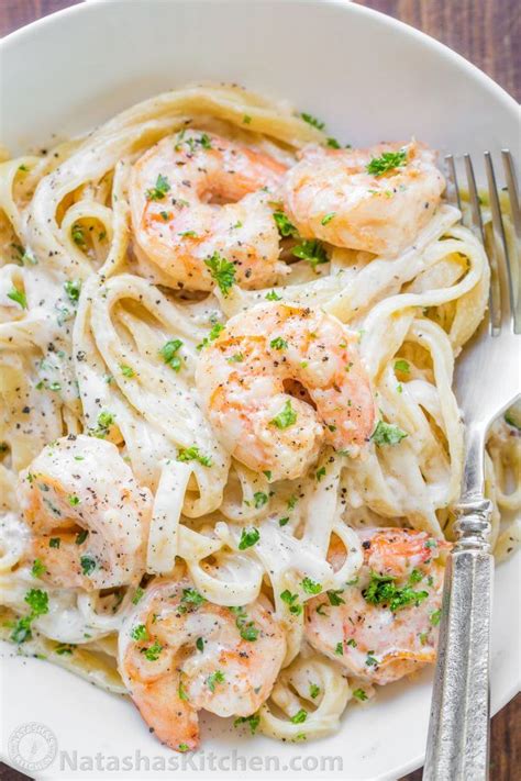 This garlic shrimp pasta is guaranteed to become a favorite! Creamy Shrimp Pasta reminds me of my favorite dish at Olive Garden with plump juicy shrimp and ...