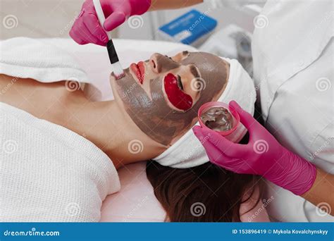 Spa Woman Applying Facial Cleansing Mask Stock Image Image Of Hands Body 153896419
