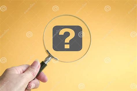 A Large Question Mark Through A Magnifying Glass Stock Photo Image Of