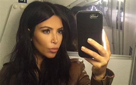 kim kardashian celebrates national selfie day with a sizzling cleavage photo
