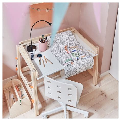 Check out ikea's stylish home furnishing and home that's why trofast storage boxes fit under the lids of the table. FLISAT Children's desk - adjustable | Childrens desk, Ikea ...