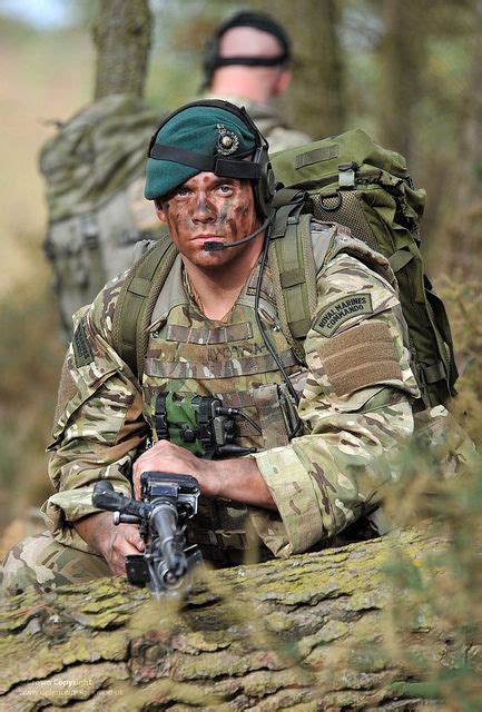 Royal Marine Commandos On Exercise In British Woodland By Defence