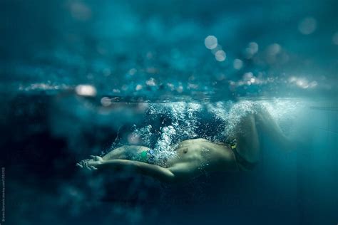 Underwater Professional Swimmer By Stocksy Contributor Branko