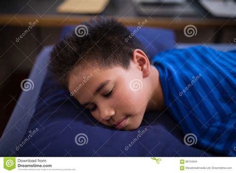 High Angle View Of Boy Sleeping On Bed Stock Photo Image Of Focus