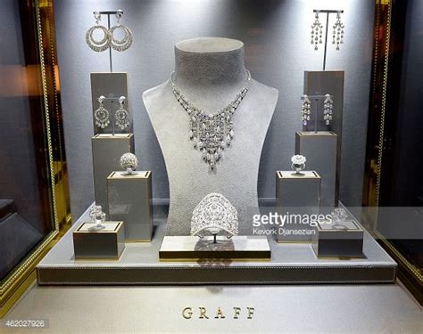 An Assortment Of Jewelry Displayed In A Display Case