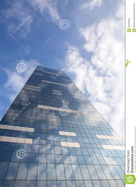 Modern Office Building On Sky Background With Clouds