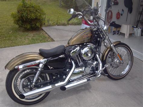 It's a fuel injected 1200, so it's got plenty of gumption, though it won't win many. 2013 Sportster 1200 Model 72 $8900 with