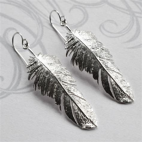 Buy sterling silver hoop, cz stud, tanzanite, opal loop & chandelier earrings for cheap. Sterling Silver Feather Drop Earrings By Martha Jackson ...