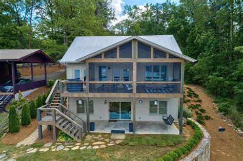 Even in july, the temperature of the water is bracing while both the water and shore are pristine. Real Estate Listing - Gorgeous Smith Lake Home For Sale