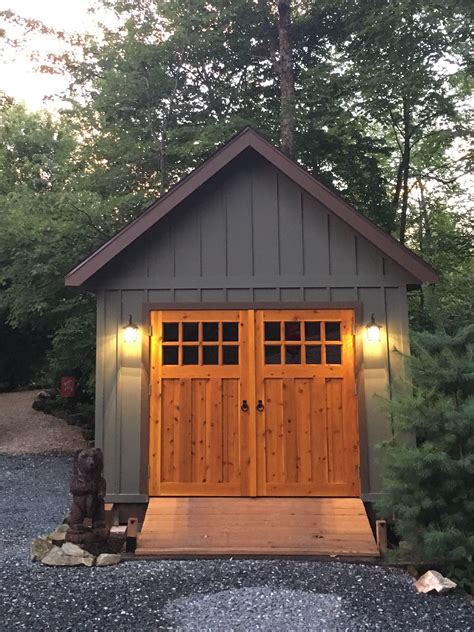 Small Garage With Custom Carriage Doors Backyard Sheds Backyard Barn