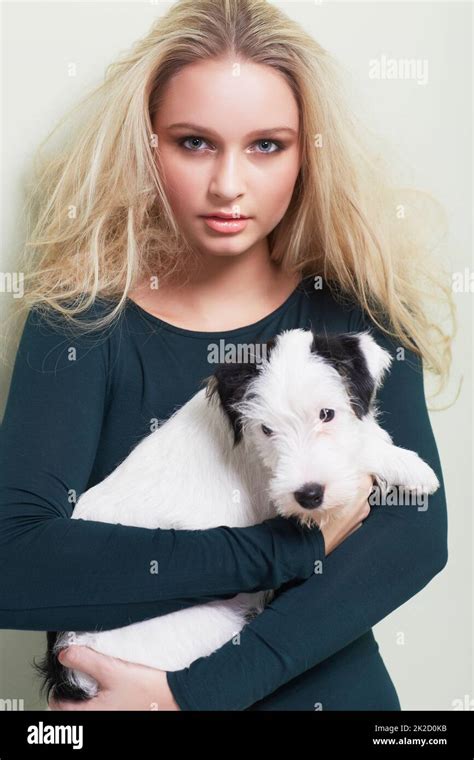 Im An Animal Lover Portrait Of A Gorgeous Young Woman Holding Her