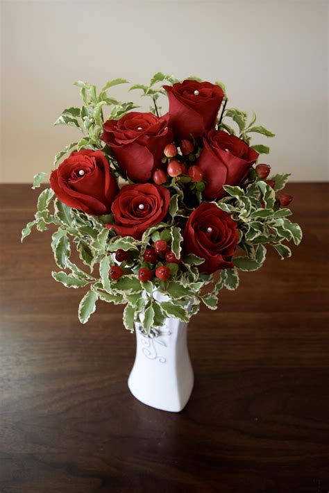 Half A Dozen Of Red Roses With Red Hypericum Flower Arrangement