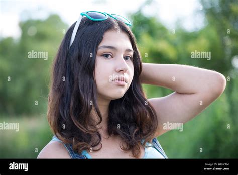 Portrait Of Beautiful Teen Girl With Sunglasses On Head Stock Photo Alamy
