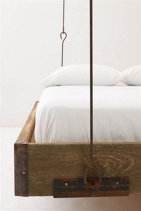 I try to imagine hanging from my ovaries for scale, and nope. LET'S STAY: Creative Hanging Bed Furniture Ideas