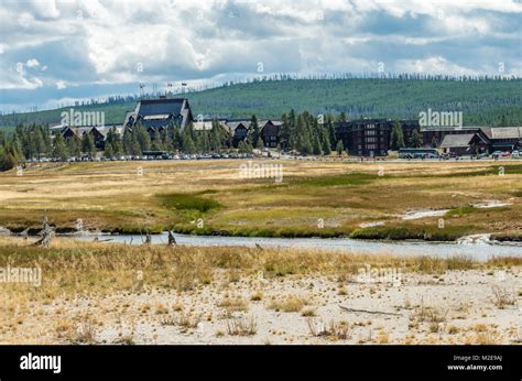 Old Faithful Visitor Center And Lodge With The Firehole River