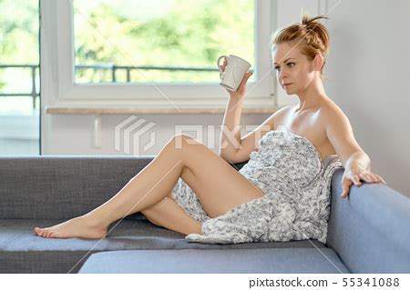 Attractive Beautiful Half Naked Woman Drinking Stock Photo
