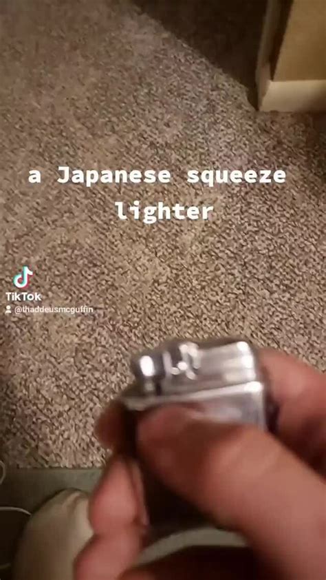 A Japanese Squeeze Lighter Cf