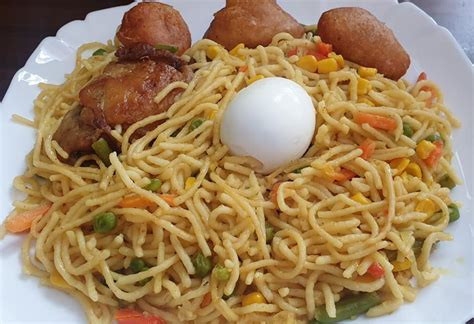 And boiled eggs or moin moin, a. Noodles Served with Boiled Egg and Fried Chicken ...