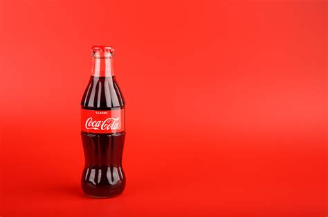 Coca Cola Bottle On Red Background Stock Photo Download Image Now