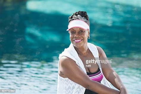 older woman in bathing suit photos and premium high res pictures getty images