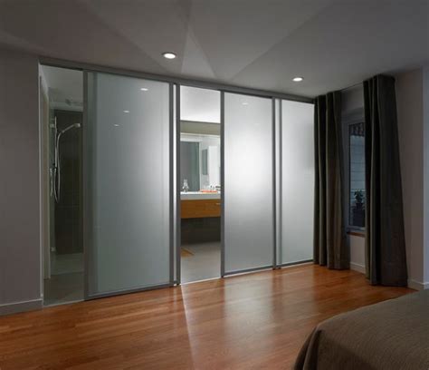 Discover the 32 different types of glass front doors for you home. Frosted glass sliding doors separate the contemporary ...