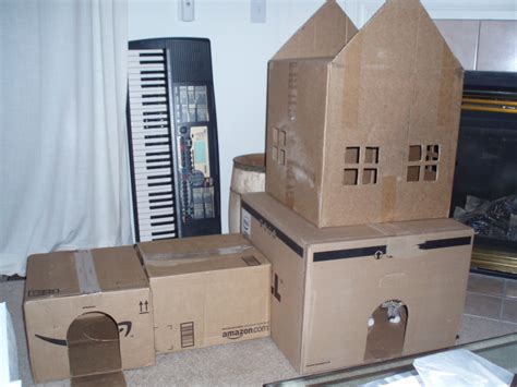 Cat Investigating Inside Cardboard House Picture Image Photo