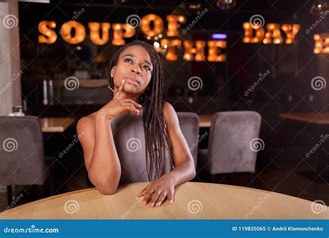 A Thoughtful Afro American Woman In A Cafe Stock Image Image Of