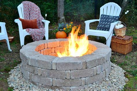 This fire pit below that has a capstone made up of series of stones cut into 5| have the stones cut by your super awesome stone yard, or cut them yourself with a circular saw. How to Build a Fire Pit | HGTV