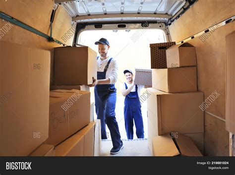Delivery Men Unloading Image And Photo Free Trial Bigstock