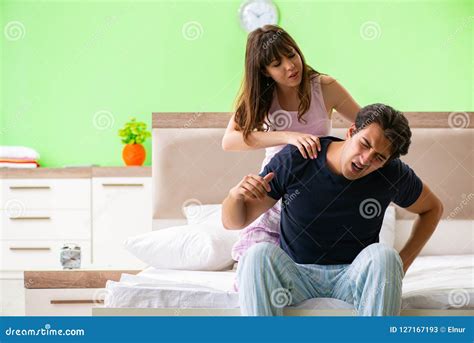 the woman doing massage to her husband in bedroom stock image image of enjoyment intimacy