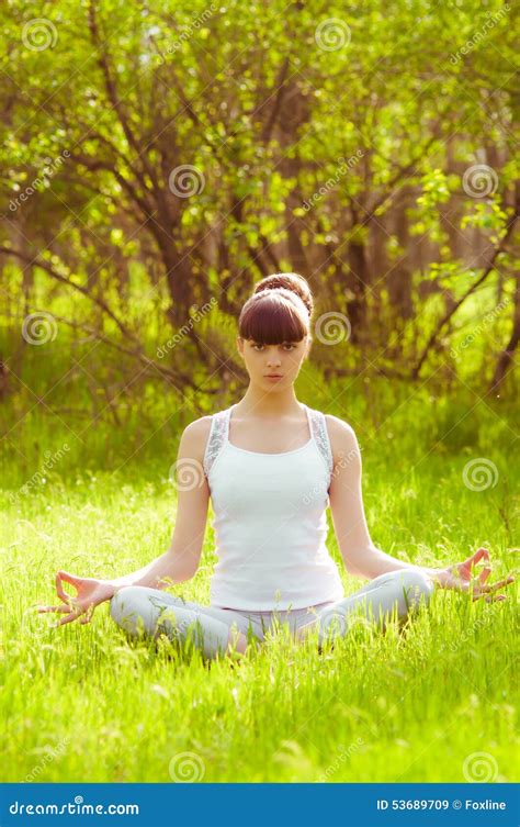 Young Girl Doing Yoga On A Green Grass Stock Image Image Of Healthy