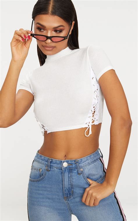 White Rib High Neck Lace Up Crop Top Tops Prettylittlething