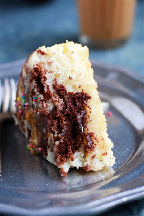 Not quite as airy and fluffy as a white cake, vanilla cake is. chocolate vanilla cake recipe | Moist chocolate vanilla ...