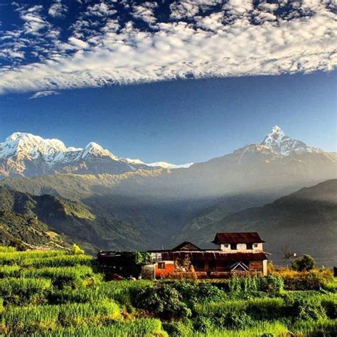 Typical Nepali Village Annapurna Range At The Background Nature