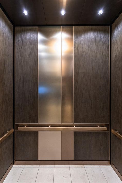 Levele 101 Elevator Interior Capture Panels In Bonded Bronze With Dark