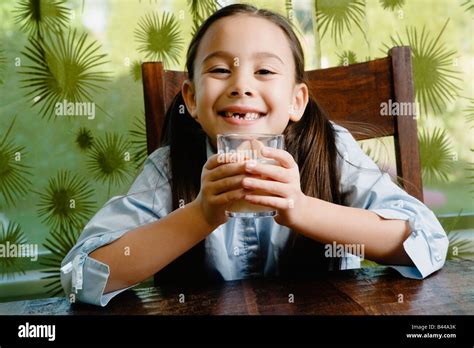 Asian Girl Drinking Milk Stock Photo Alamy