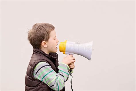 Little Boy Screaming Through A Megaphone Stock Image Image Of Play