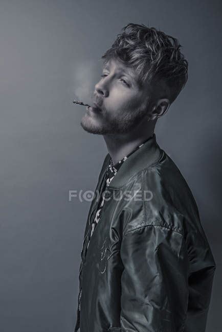 Bearded Man Smoking Cigarette — Studio Shot One Stock Photo 154379154