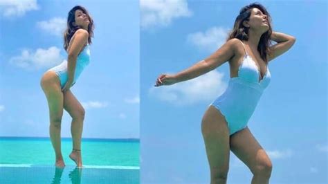 Hina Khan Soaks In The Ocean Breeze And Sets Mercury Soaring In White