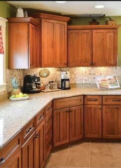 We love the wooden texture and sage green that turn this kitchen a lively place! Sage green walls + Oak Cabinets = ?? Backsplash