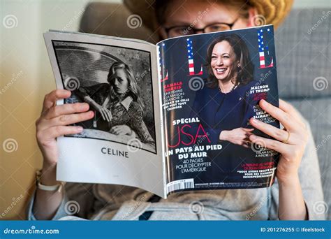 Woman Reading In Living Room The Latest Elle Magazine Featuring On Cover Kamala Editorial Image