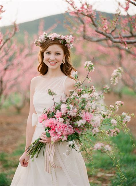 bride with cherry blossom bouquet elizabeth anne designs the wedding blog