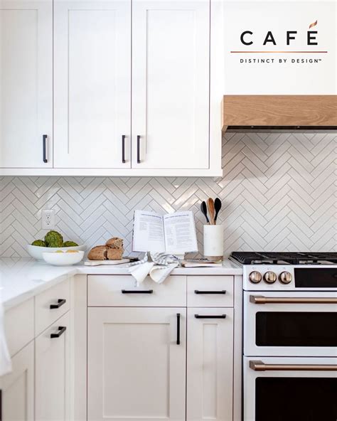 The timeless white on kitchen cabinets is on its way out in 2020. This cozy corner of the kitchen by Construction to Style ...