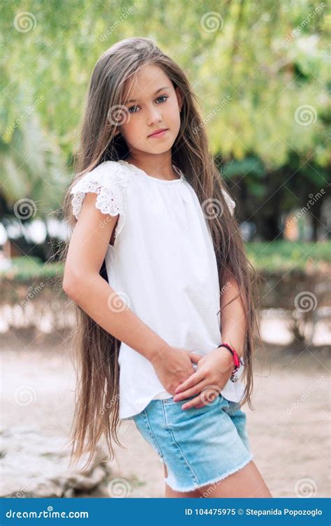 Beautiful School Girl With Long Hair In The Park Prety Girl Wi Stock