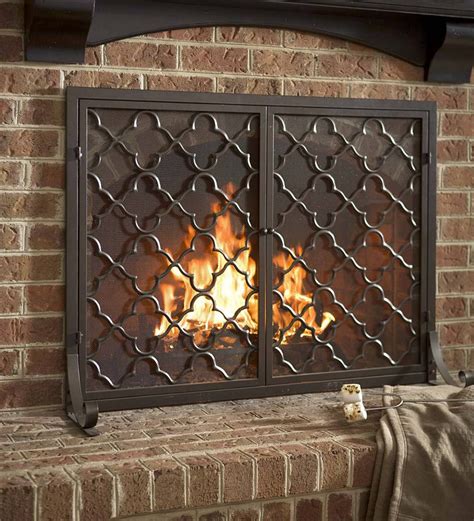 This Two Door Fireplace Screen Keeps The Fire Contained And Your Sense