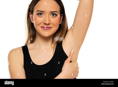 Smiling Young Woman Shows Her Shaved Armpit And Showing Thumbs Up On A