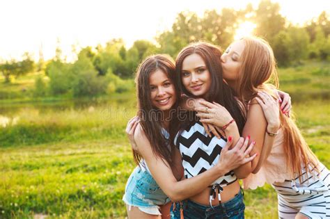 Girlfriends Friendship Happiness Community Concept Three Smiling Friends Hugging Outdoors In
