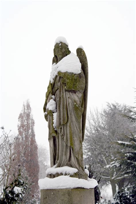 Free Images Snow Winter Stone Monument Statue Weather Cemetery