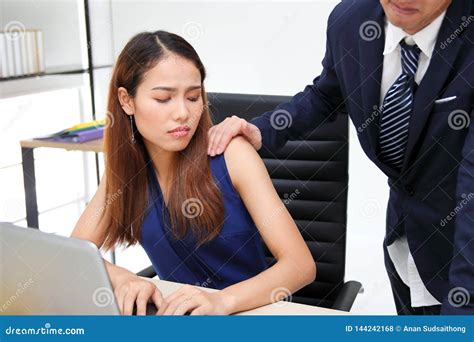 Man Boss Touching Woman Knee In Workplace Of Office Sexual Harassment