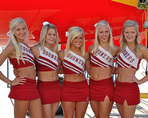 Texas And Oklahoma Cheerleaders Support Fans As They Pull An 83000